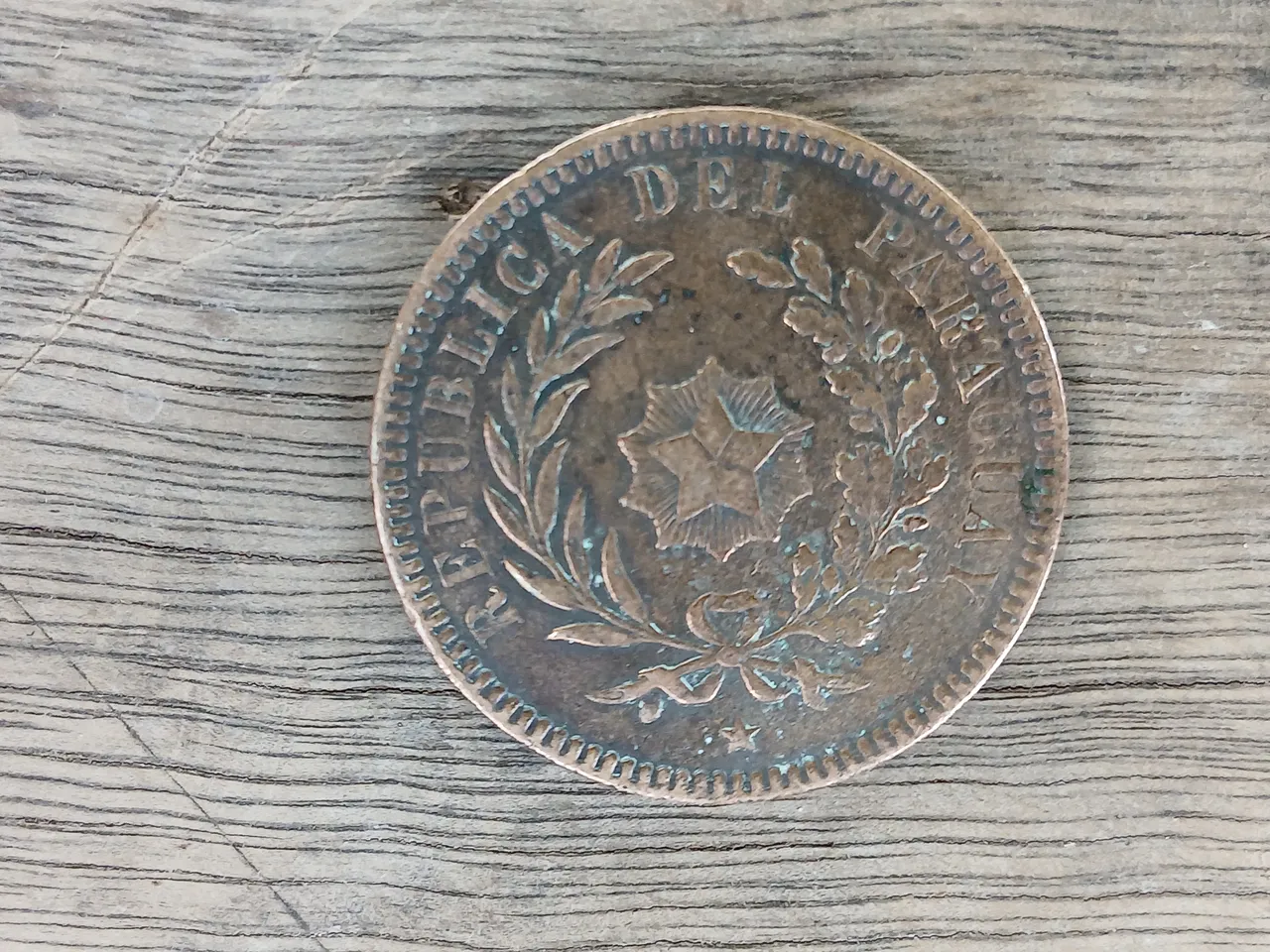 Moneda antigua de centésimos de Paraguay — vista 1